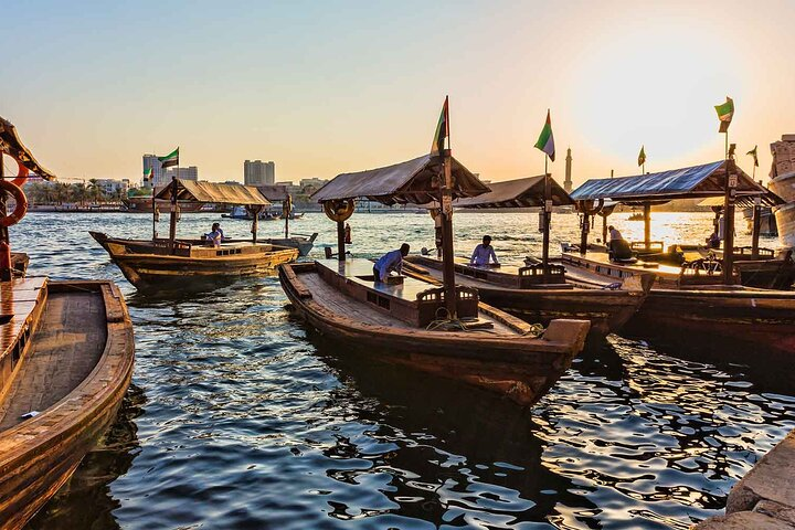 Discover Dubai's rich history as you navigate through iconic sites and hidden gems from traditional wooden boats to the serene waters capturing the essence of the city's past.
